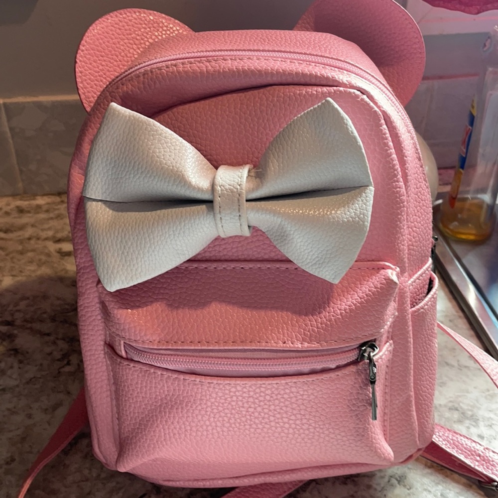 Pink mini back pack Minnie Mouse ears bow faux caviar leather.